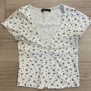 Brandy Melville T-shirt, black and white flower, size small